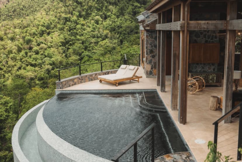 Two pools connected by a slide at Valhalla St John, Catherineberg